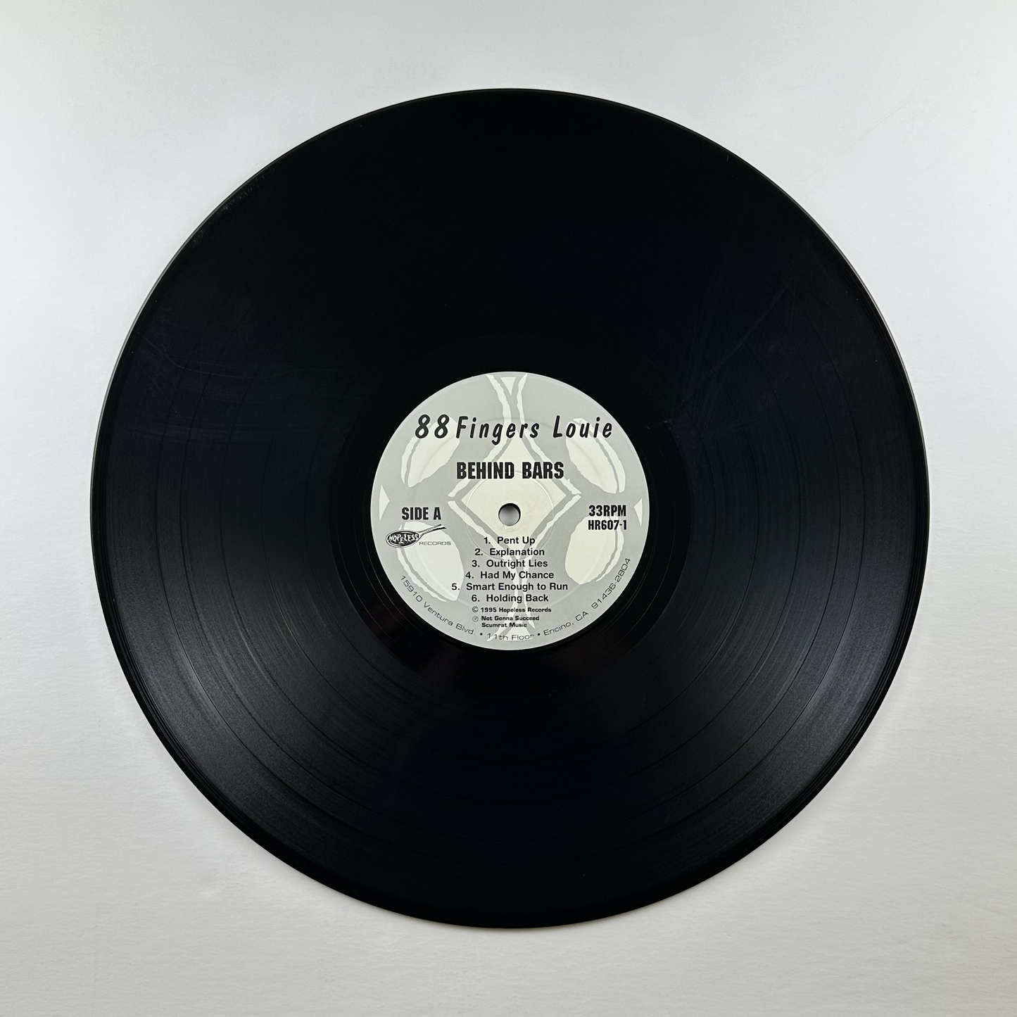 Pre-Owned :: 88 Fingers Louie "Behind Bars" LP