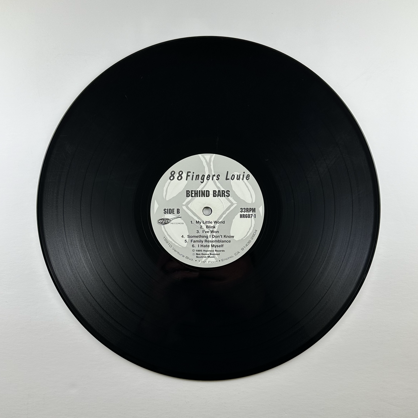 Pre-Owned :: 88 Fingers Louie "Behind Bars" LP