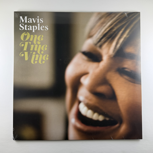 Album cover of Mavis Staples' 'One True Vine' with a close-up of a person's face.