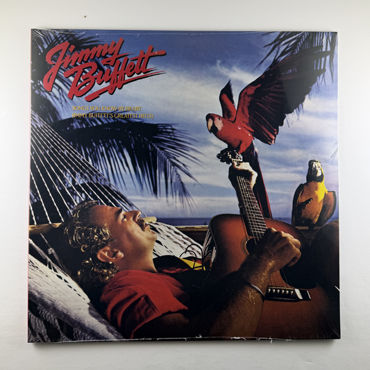 Vinyl record cover featuring a person with a guitar, parrots, and palm trees with 'Jimmy Buffett' text.